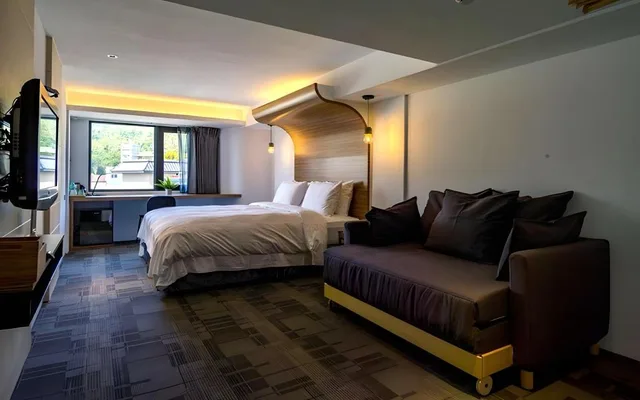 غرفة بريميير ثلاثية بسرير كينج مع أريكة، Watermark Hotel-The Harbour 1/5