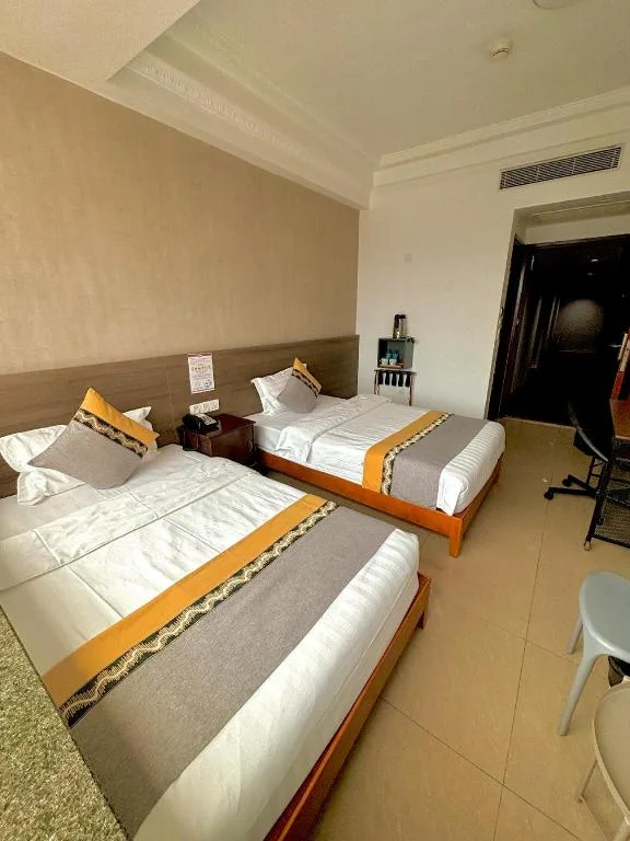 غرفة بسريرين منفصلين، Grand Harbour Hotel 3/9
