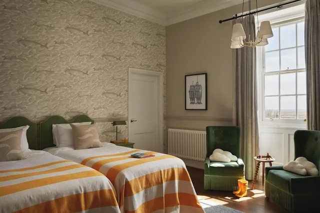 غرفة ديلوكس عائلية بسرير كينج بغرفتي نوم بإطلالة، Moonfleet Manor Hotel 1/2