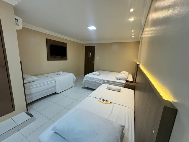غرفة رباعية بسرير كوين وسريرين منفصلين بإطلالة على البحر، Hotel Luar De Itapua 4/9