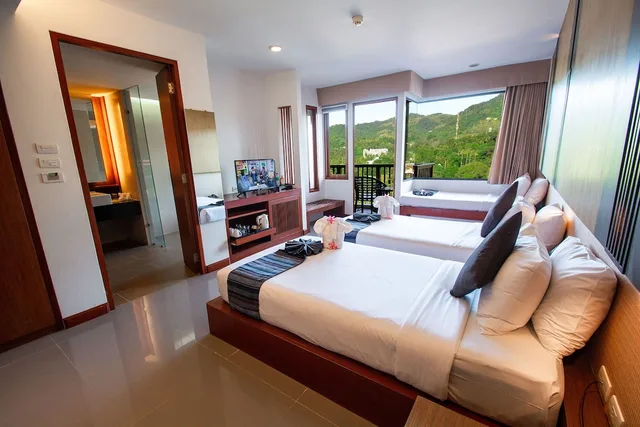 غرفة غراند بسرير مزدوج أو سريرين منفصلين، Peach Blossom Resort 1/3