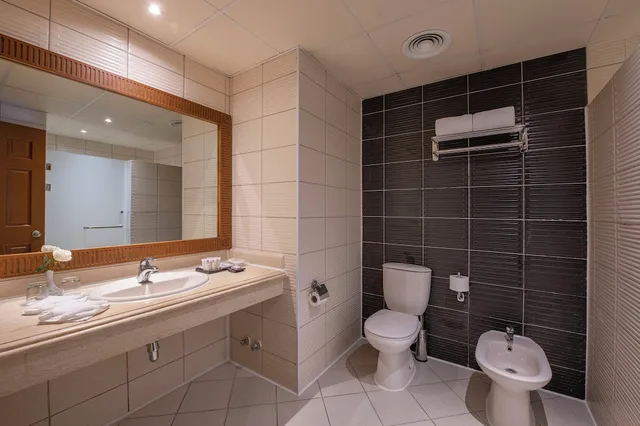 Family Double Suite with Garden View 2A+3C، Charmillion Gardens Aqua Park Ex Sea Gardens Resort 9/10