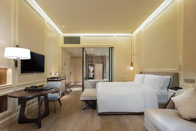 جناح جونيور بإطلالة على البحر بغرفة نوم واحدة، Hilton Dalian Golden Pebble Beach Resort 3/4