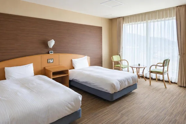 غرفة بسريرين منفصلين بإطلالة على البحر، Shiretoko Noble Hotel 2/2