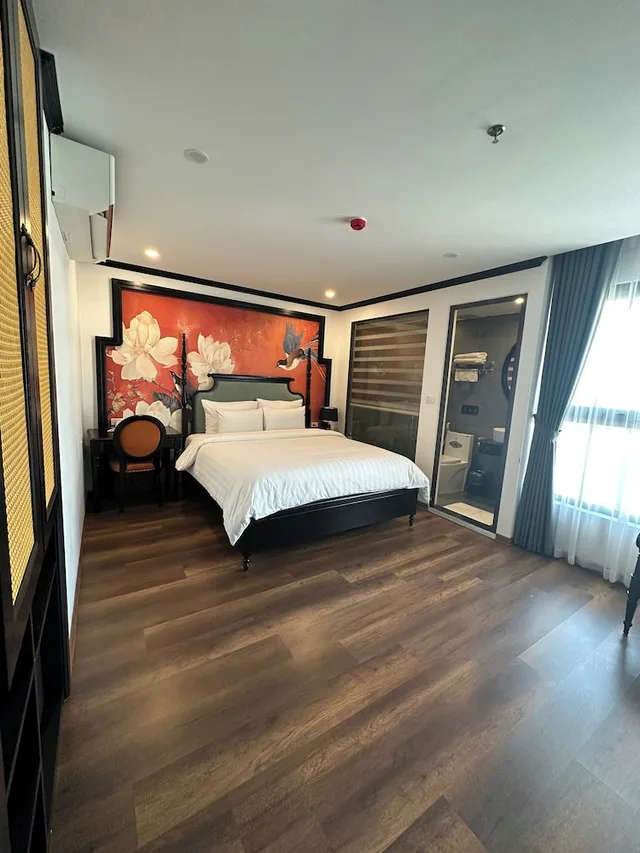 غرفة ديلوكس رباعية بسرير كينج وسريرين منفصلين، Aquarius Premium Hotel 2/7