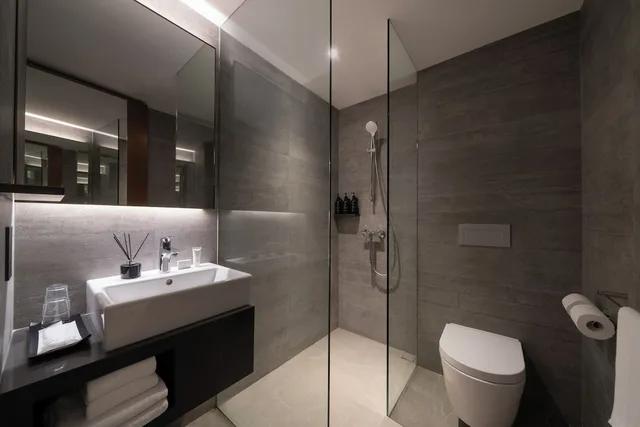 جناح جونيور بسرير كينج مع أريكة، Oakwood Bencoolen Singapore 6/7
