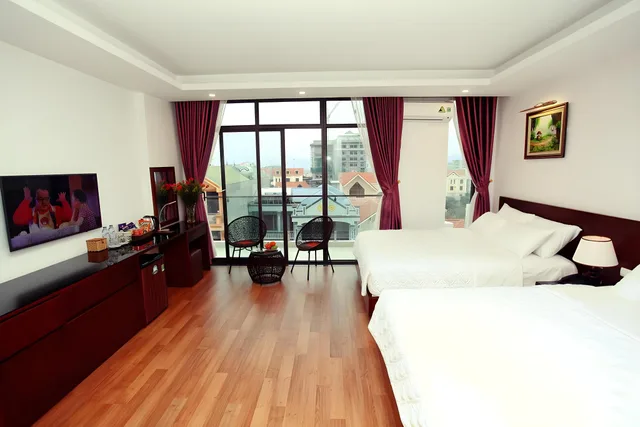 غرفة رباعية، Camellia Hotel 1/2