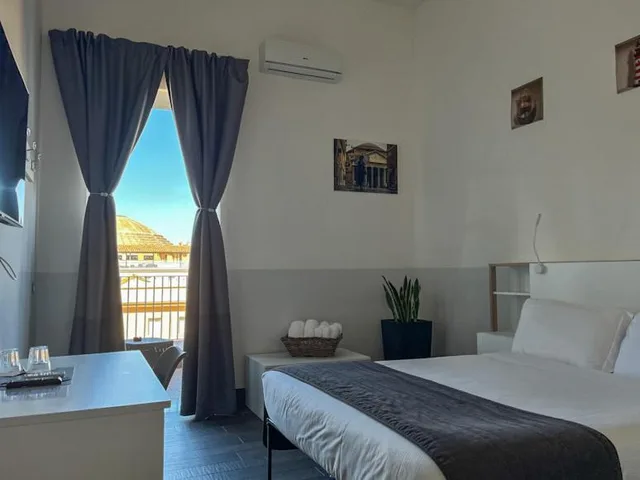 غرفة رباعية، Arch Rome Suites 4/10