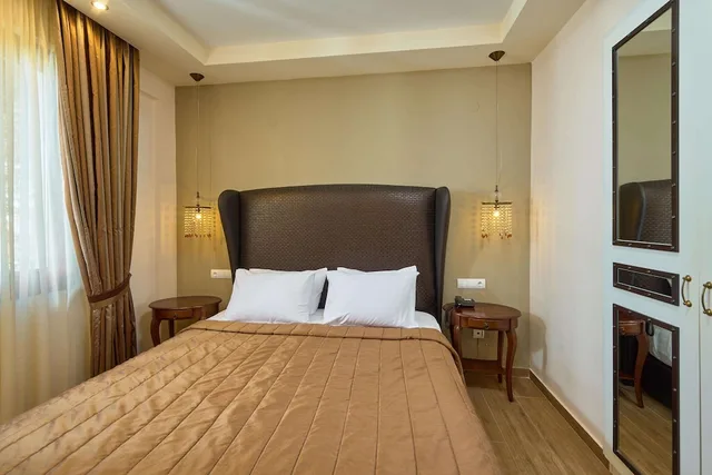 جناح بسرير مزدوج مع أريكة، Mediterranean Village Hotel & Spa 1/4