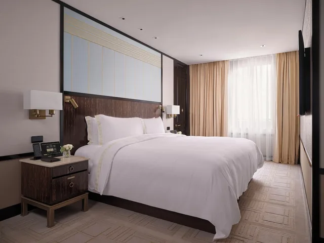 غرفة ديلوكس بسرير كينج لذوي الإعاقة، The Peninsula London 1/2