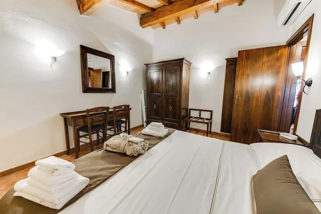 غرفة عائلية بسرير مزدوج مع أريكة، Borgo Magliano Resort 1/3