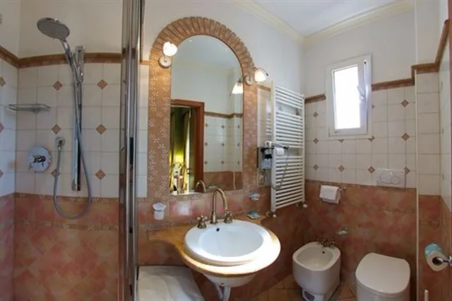غرفة رباعية، Hotel Pedrini 5/7