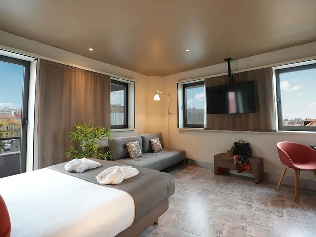 جناح جونيور بسرير مزدوج مع أريكة، Mercure Porto Centro Santa Catarina 1/4