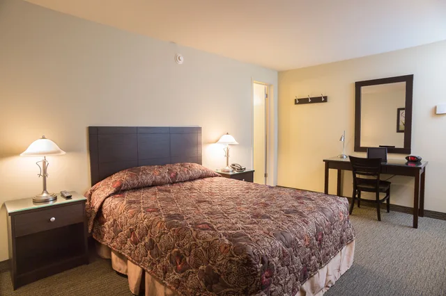 غرفة سوبيريور بسرير كوين بإطلالة على النهر، Motel Et Appartements Du Fleuve 2/3