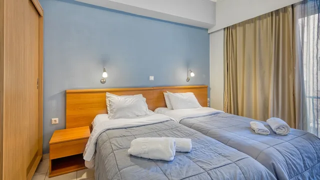 غرفة ثلاثية بسريرين منفصلين مع أريكة، Diros Hotel 1/10