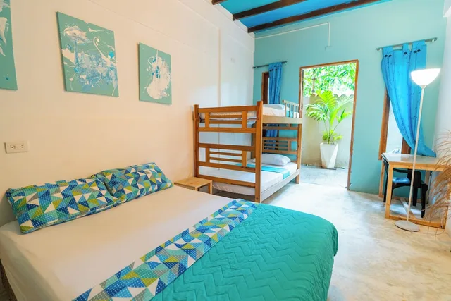 غرفة كومفورت رباعية بسرير بطابقين وسرير كوين، Tayrona Juancho House Hostel 2/4