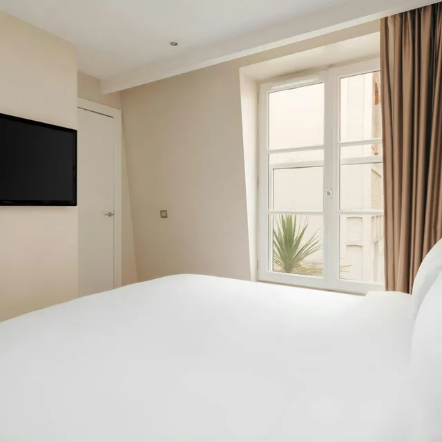 جناح بسرير كينج بمطبخ صغير، L Edmond Hotel Parc Monceau 2/5