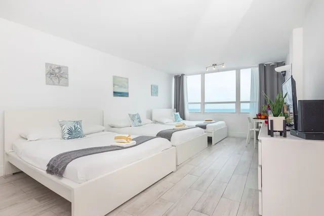 جناح استوديو كلاسيكي بسريرين كوين، Girasole Apartments 1/10