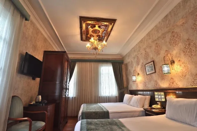 غرفة سوبيريور ثلاثية بسرير كوين وسرير فردي، Blue House Hotel 1/4