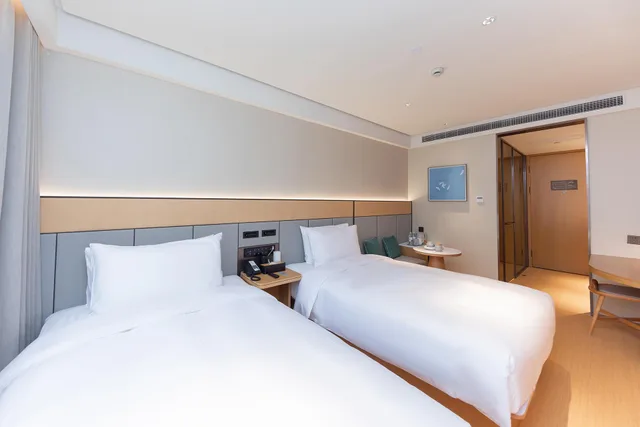 غرفة قياسية بسريرين منفصلين، Jinjiang Inn Shanghai Hailun Rd 2/4