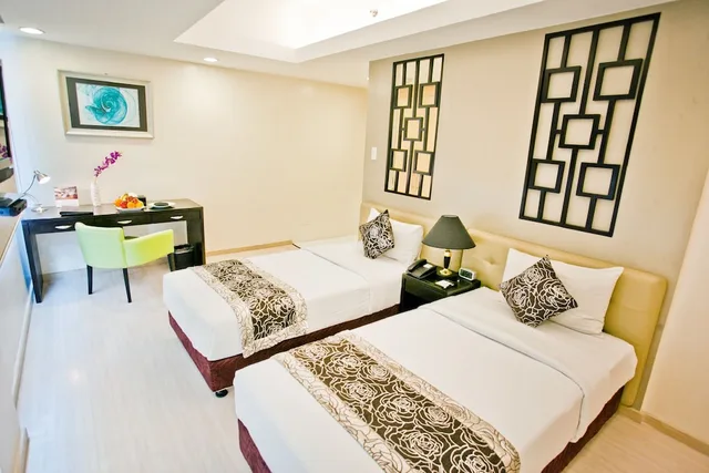 غرفة بريميير بسريرين منفصلين، The Exchange Regency Residence Hotel 1/4