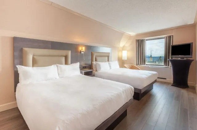 غرفة جونيور بسريرين مزدوجين، Le Concorde Hotel 1/1