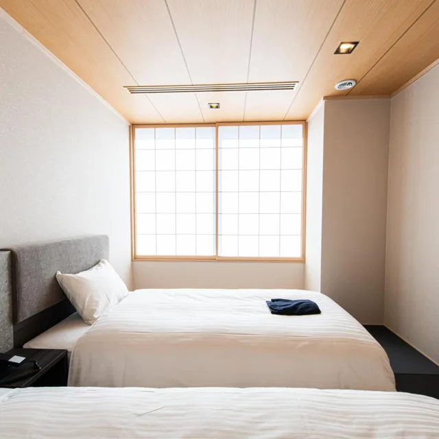 غرفة بسريرين منفصلين بأرضية تاتامي، Welina Hotel Premier Osaka Namba 3/4