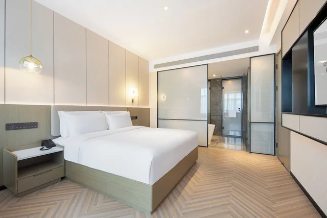 جناح بسرير كوين بإطلالة على المدينة، Rezen Longuu Hotel (Guangzhou Baiyun Airport Cultural Tourism City) 2/6