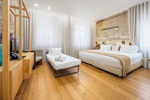 غرفة ديلوكس ثلاثية بسرير كوين، Porta Nobre Exclusive Living Hotel 8/10