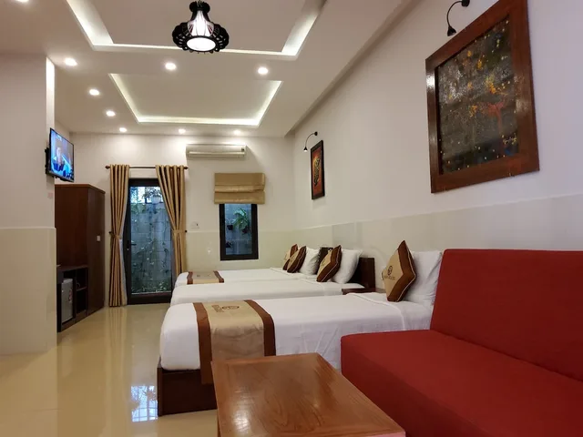 غرفة ديلوكس عائلية بسرير مزدوج وسريرين منفصلين بشرفة، Bean Grass Homestay 2/7