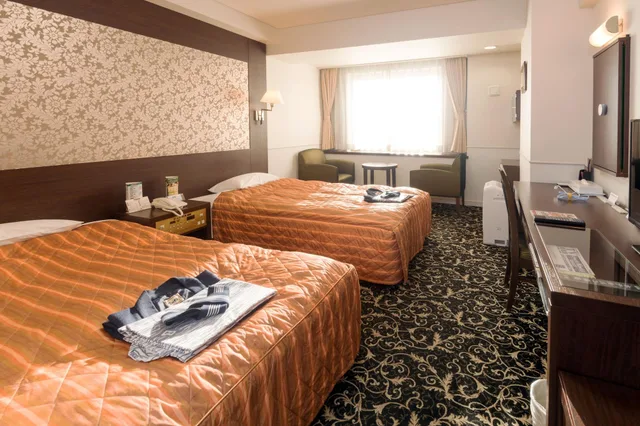 غرفة بسريرين منفصلين بإطلالة على النهر، Hotel Global View Kushiro 1/5
