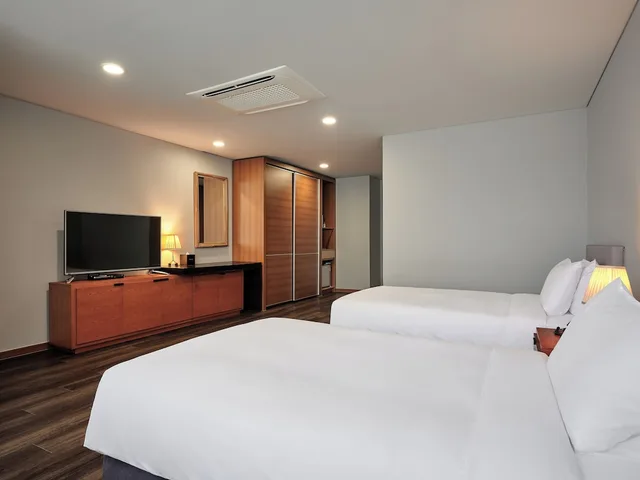 غرفة ديلوكس اقتصادية بسريرين منفصلين، Ramada Hotel & Suites by Wyndham Seoul Namdaemun 4/7