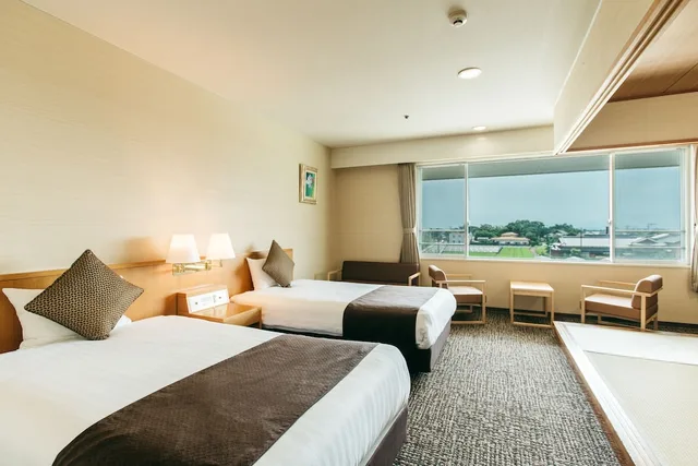 غرفة يابانية غربية بسريرين منفصلين وفرشتي فوتون بحوض استحمام، Kamenoi Hotel Yanagawa (ex Kanpo no Yado Yanagawa) 2/4
