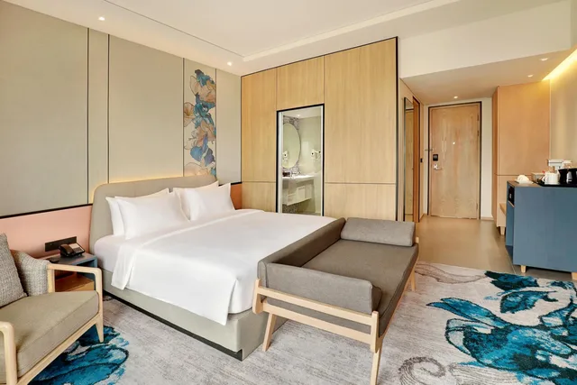 غرفة ديلوكس بسرير كينج وسرير كوين، Mercure Samarinda 3/6