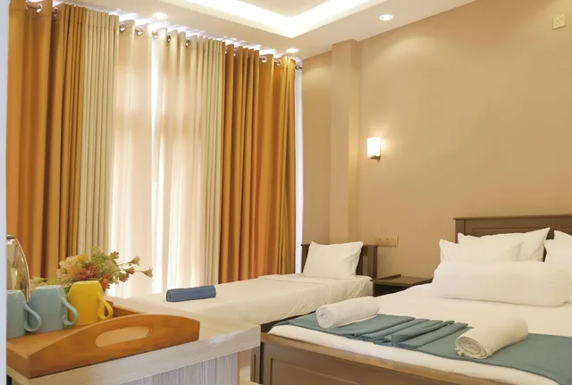 غرفة بريميير ثلاثية بسرير كوين، Nine Arch Holiday Resort 1/10