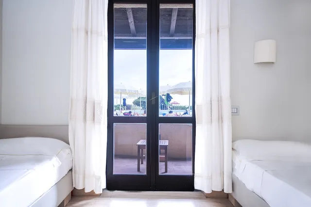 غرفة عائلية رباعية بسرير مزدوج وسريرين منفصلين، Hotel Calabona 5/5