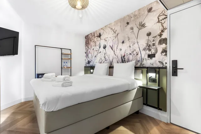 غرفة بسرير كينج وسرير كوين، Dutch Design Hotel Vondelpark 1/2