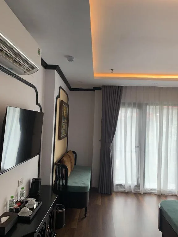 غرفة متصلة بسرير كينج وسريرين منفصلين، Aquarius Premium Hotel 2/5