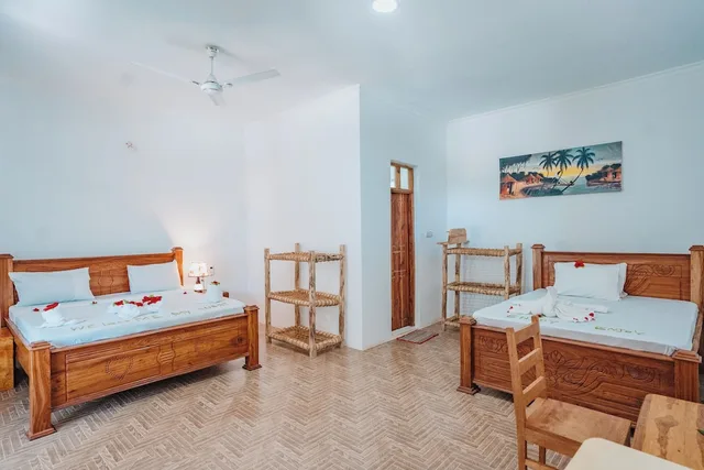 غرفة عائلية رباعية بسريرين مزدوجين بإطلالة على البحر، Bella Vista Resort Zanzibar 1/1