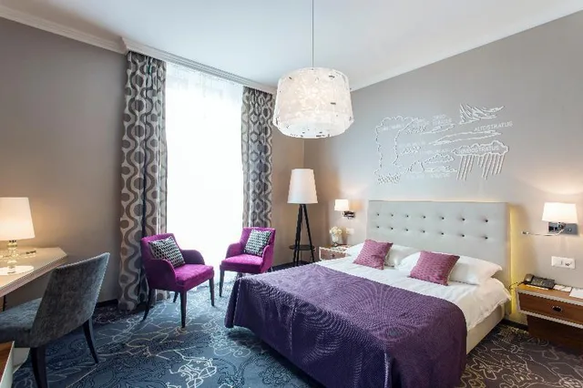 Style, Double Bed, Lake View, Schweizerhof 1/1