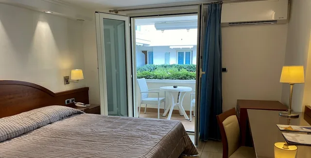 غرفة اقتصادية بسرير مزدوج أو سريرين منفصلين، HOTEL OLIMPICO 1/3