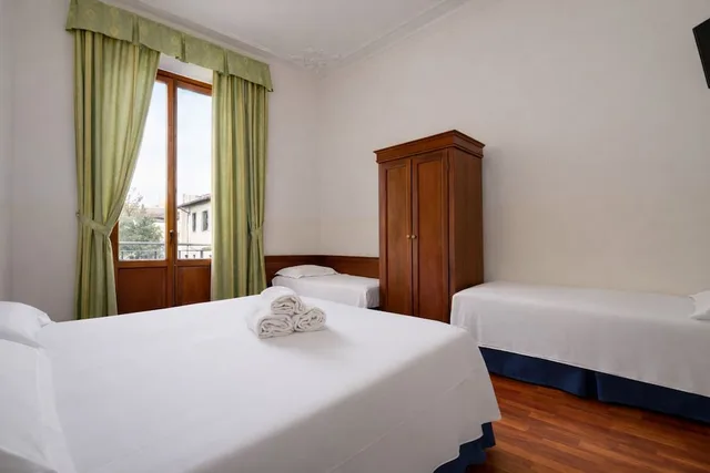 غرفة رباعية بسرير مزدوج وسريرين منفصلين، Palazzo Vecchio Hotel 2/10