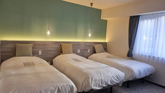 غرفة ثلاثية بثلاثة أسرّة، Kotoni Green Hotel 1/3