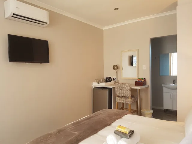 غرفة قياسية بسرير كوين بغرفة نوم واحدة، Melkbosch Guesthouse 3/3