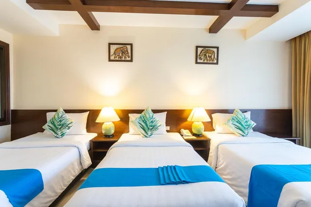غرفة ديلوكس عائلية، Coconut Village Resort 1/3