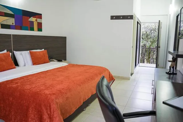 غرفة قياسية بسرير كينج، Hotel San Juan Internacional Ex Ramada Bucaramanga 1/10