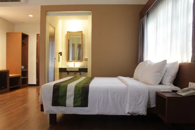 غرفة ديلوكس بسرير كينج، Grand Whiz Hotel Nusa Dua 5/8