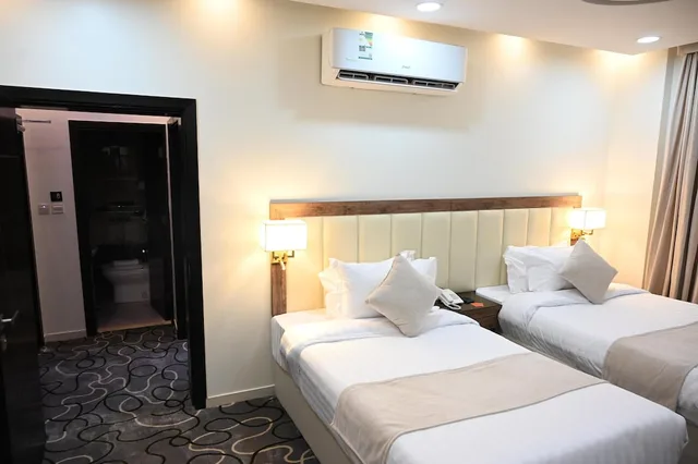 غرفة بسريرين منفصلين، فندق فيوليت ينبع(Violet Hotel) 3/7