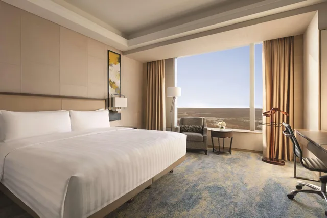 غرفة ديلوكس بسرير كينج، Shangri-La Songbei Harbin 1/3