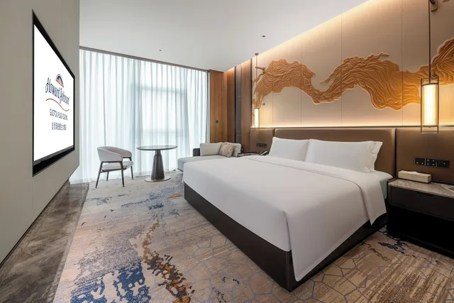 غرفة ديلوكس بسرير كينج، Howard Johnson By Wyndham Guotou Plaza Zigong 2/3